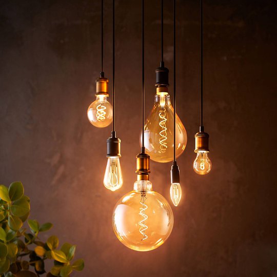 Philips-LED-lamppu E27 A60 5,5W 2.000K gold, him.